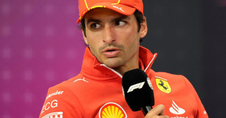 Carlos Sainz penalty for smooth operator - Carlos Sainz with the mic in the press conference.